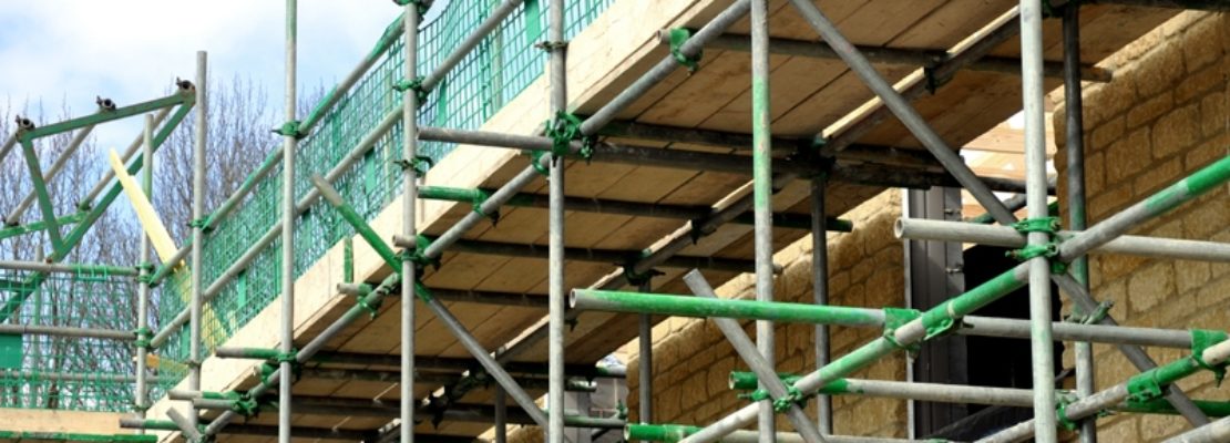 Houses with scaffolding