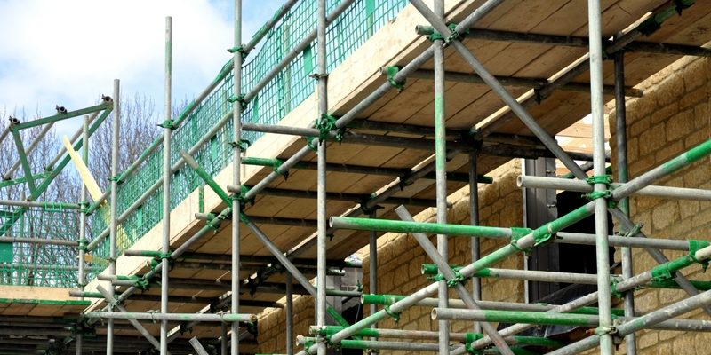 Houses with scaffolding