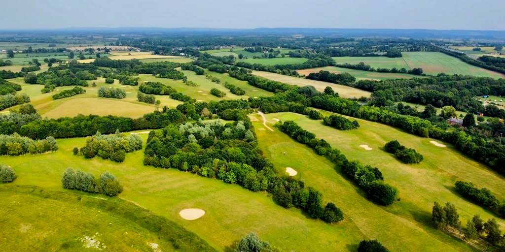 aerial view of Waterstock golf course, set amongst the verdant Oxfordshire countryside